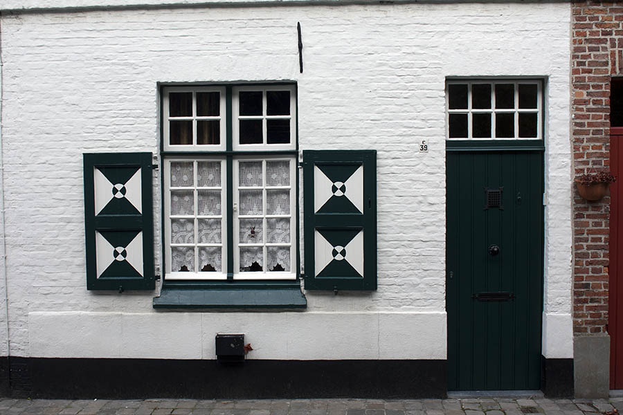 Photo 00159: Green door and window with white details
