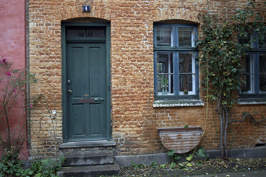 Photo 01309: Panelled, teal door and Dannebrog window