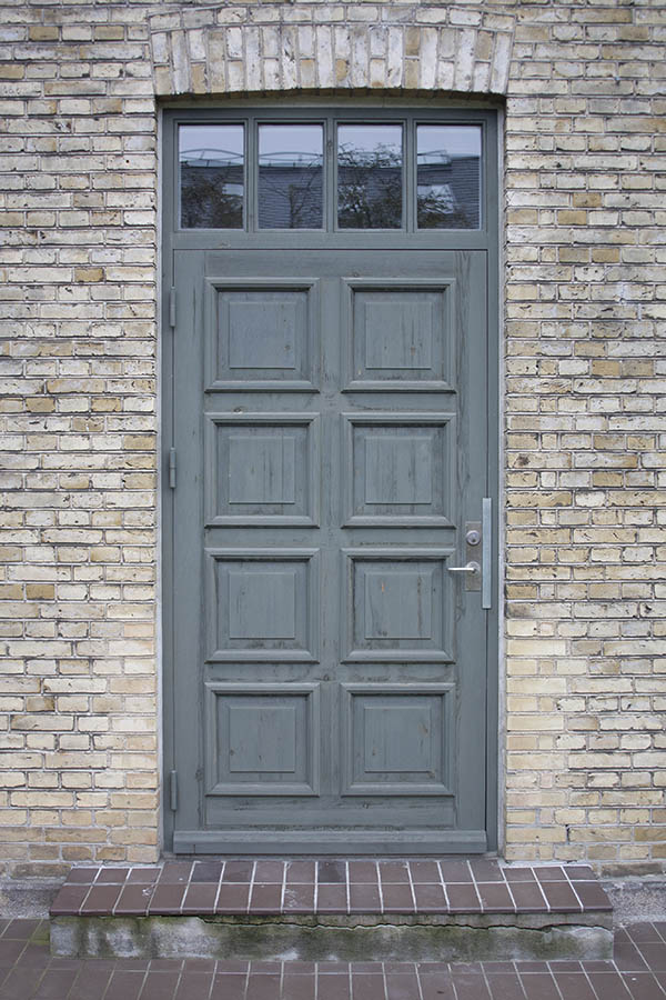 Photo 01390: Panelled, teal door with top window