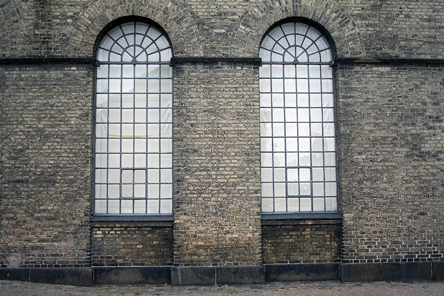 Photo 01401: Two large, formed, black metal windows
