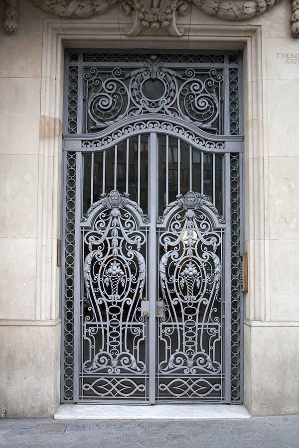 Photo 02412: Metal, grey gate with glass behind