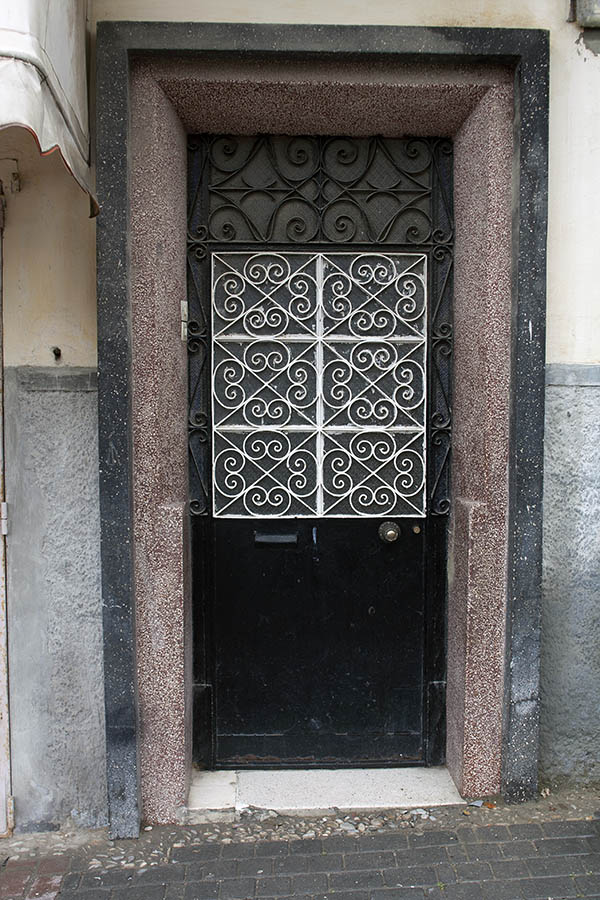 Photo 02696: Black metal door with decorated lattice