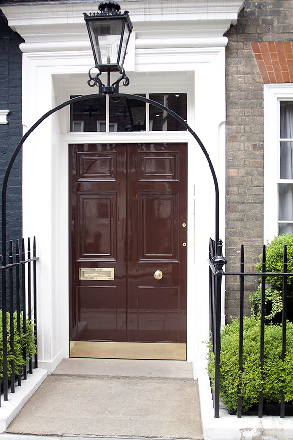 Photo 04754: Panelled, shiny brown double door with top window