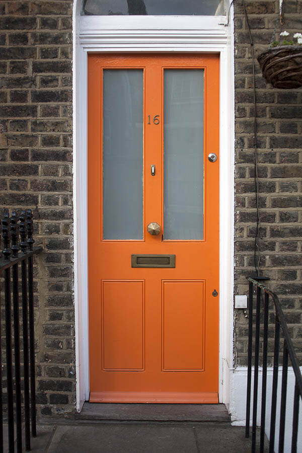 Photo 05244: Panelled, orange door with fan light