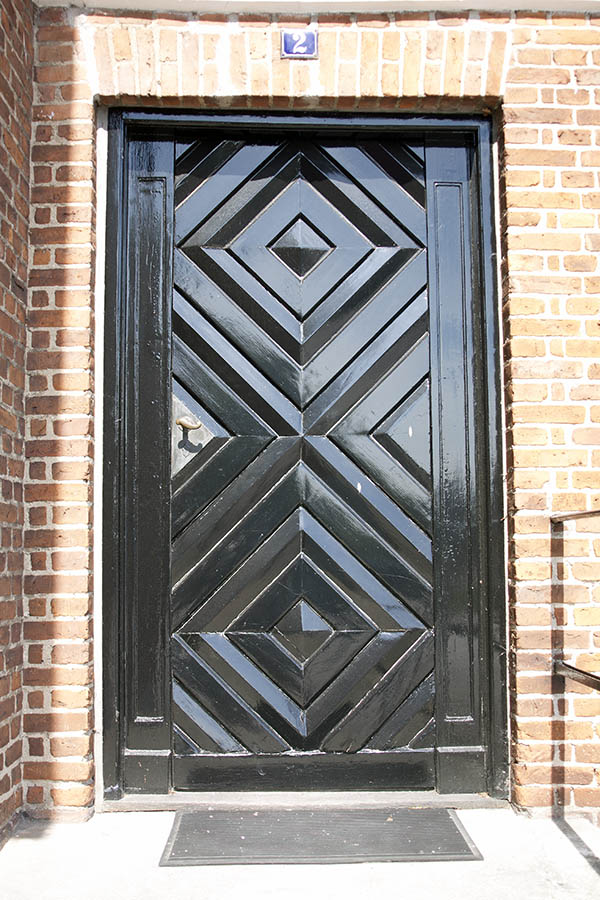 Photo 06056: Panelled, black door with diamond-shaped pattern