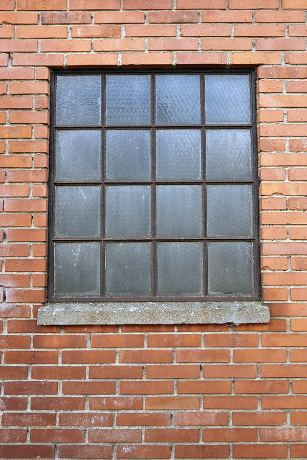 Photo 08224: Rusty, brown metal window with 16 panes