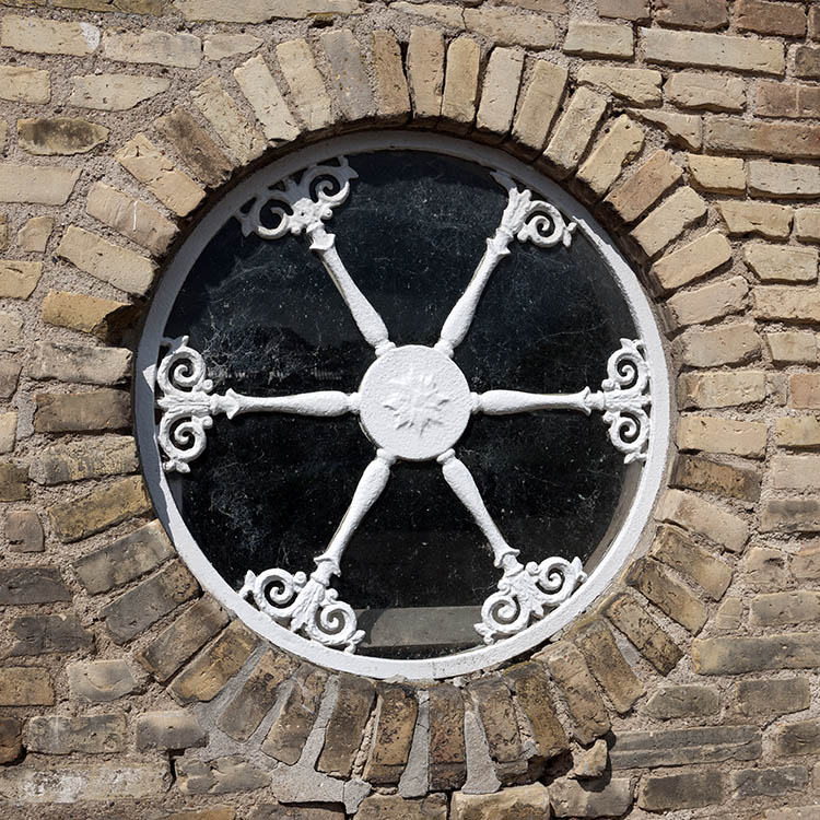 Photo 08945: Round, white, cast iron window
