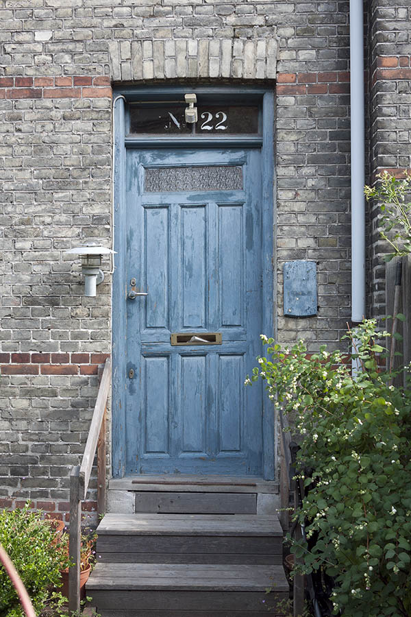 Photo 09011: Panelled, teal door with door light and top window