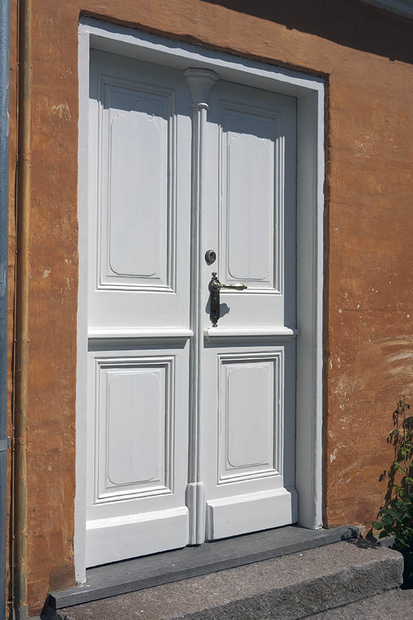 Photo 09187: Carved, panelled, white double door
