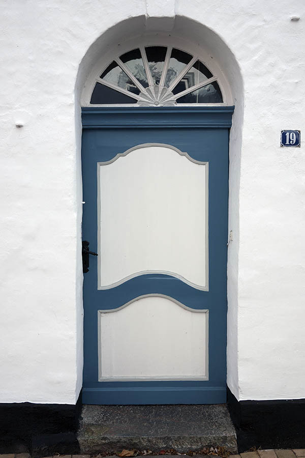 Photo 09386: Carved, panelled, blue, grey, and white door with fan light