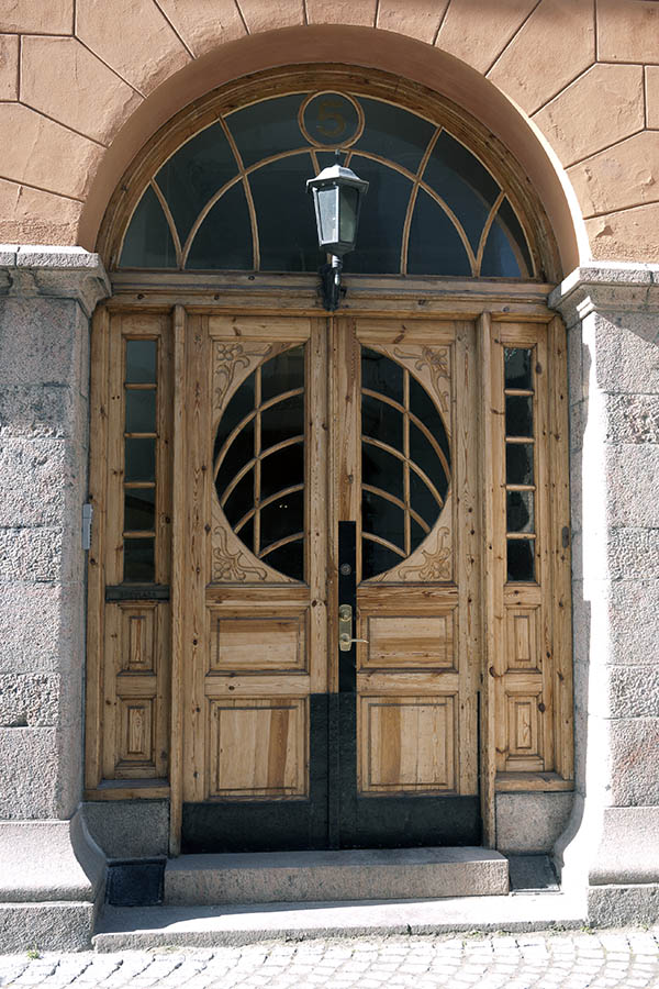 Photo 10141: Formed, panelled, lacquered double door in Art Nouveau style with round door light and fan light