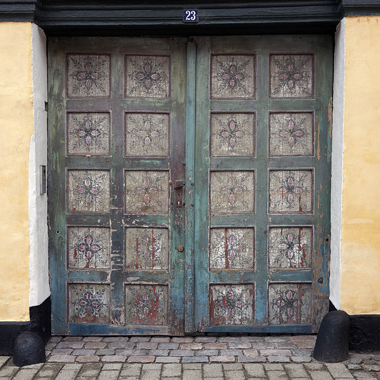 Photo 10675: Panelled, teal, pink, red, black and white gate