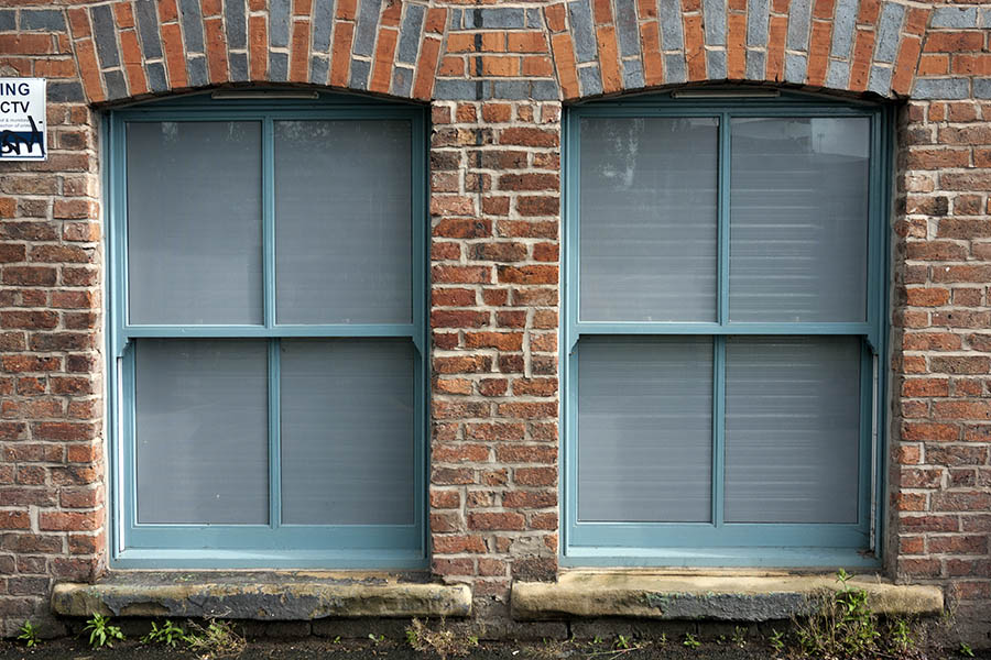 Photo 11591: Two teal sash windows