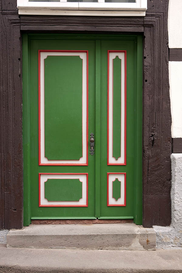 Photo 12120: Panelled, green, red and white door with sidepiece