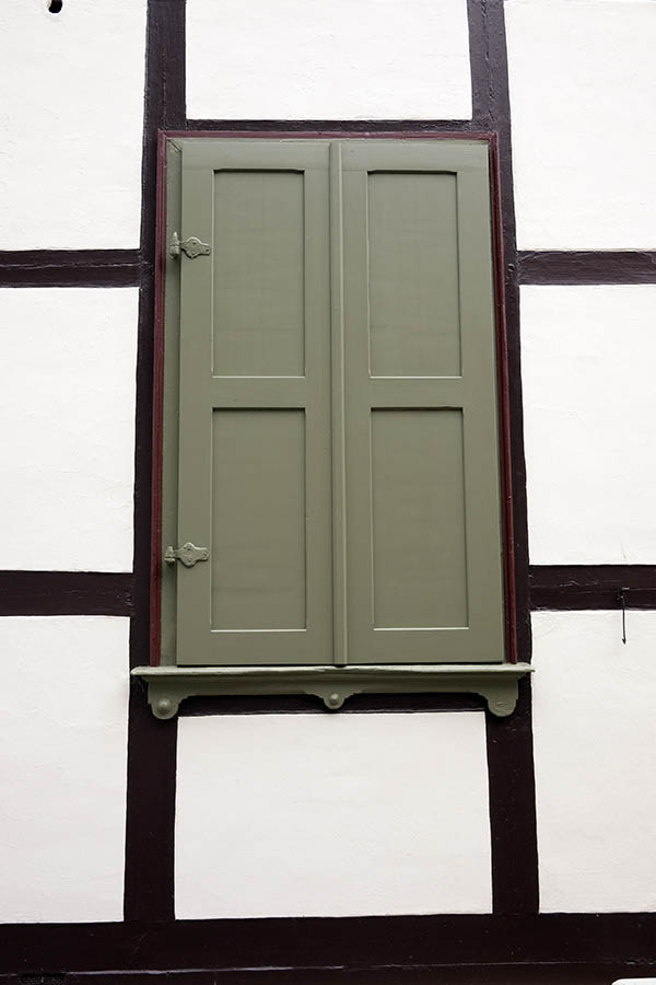 Photo 12369: Carved, panelled, brown-grey shutters