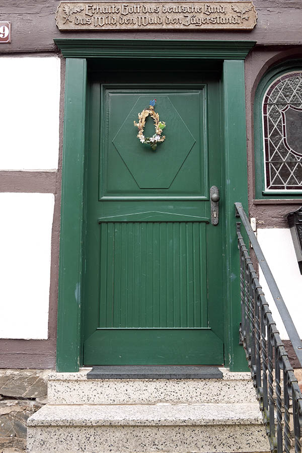 Photo 12490: Panelled, green door
