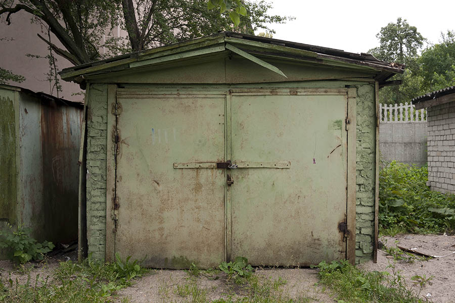 Photo 12762: Green metal garage door gate