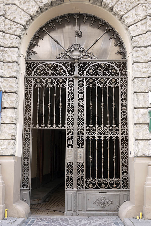 Photo 13795: Large, light grey, latticed gate with fan light