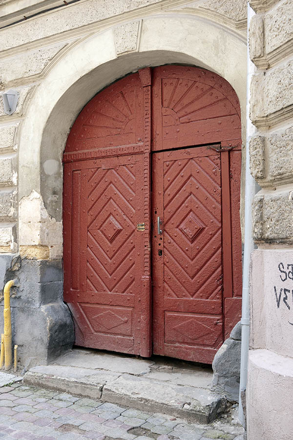 Photo 13899: Worn, panelled, red gate