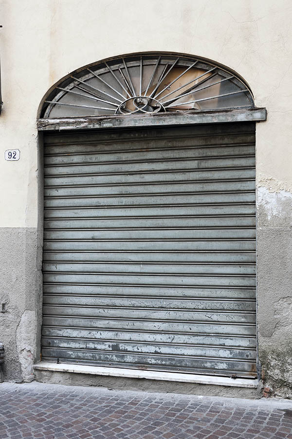 Photo 15060: Teal metal security shutter with fan light