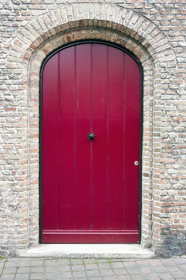 Photo 15742: Formed, cerise red door made of planks