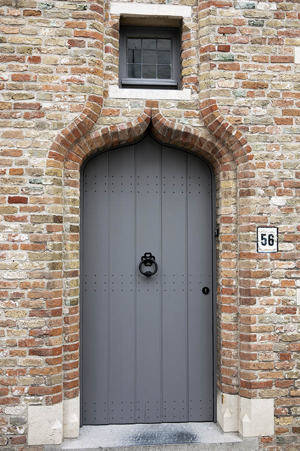 Photo 15915: Formed, grey door made of planks with top window
