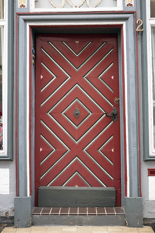 Photo 16190: Panelled, grey, red and white door with white top window