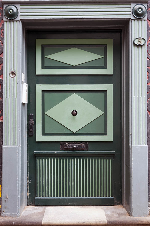 Photo 16263: Wide, panelled, carved, green, light green and grey door