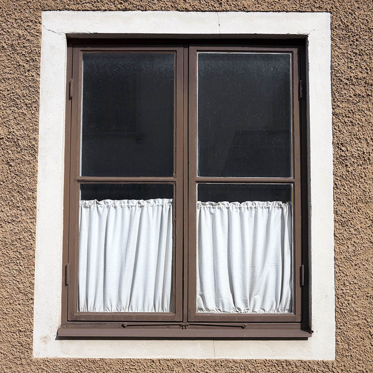 Photo 18250: Brown window with two frames and four panes in a white outer frame
