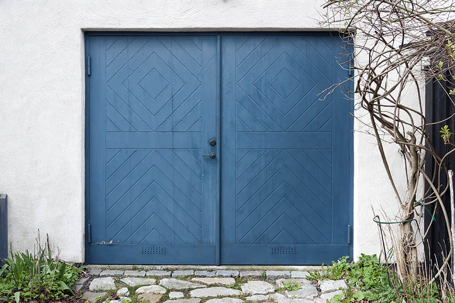 Photo 18352: Blue garage door with diagonal pattern