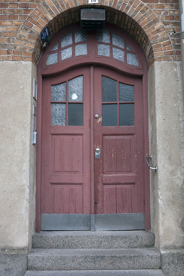Photo 18600: Panelled, formed, red double door with fan light