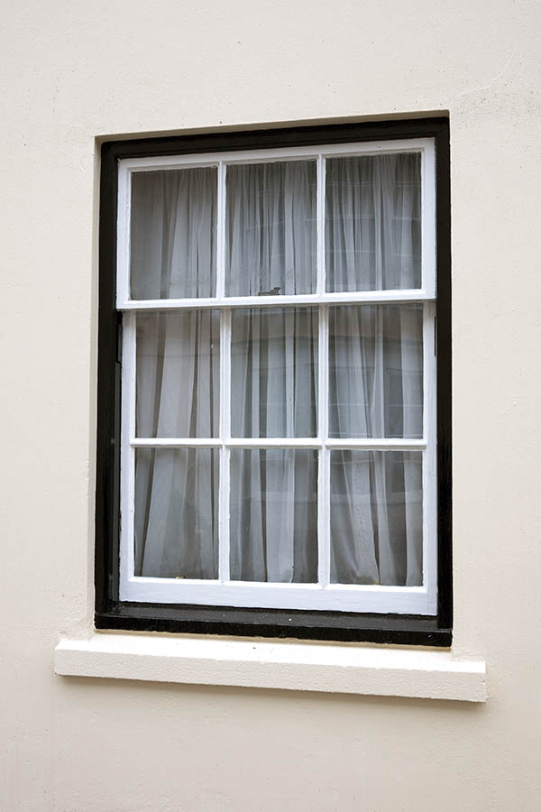 Photo 18807: Sash window with nine white panes in a black frame