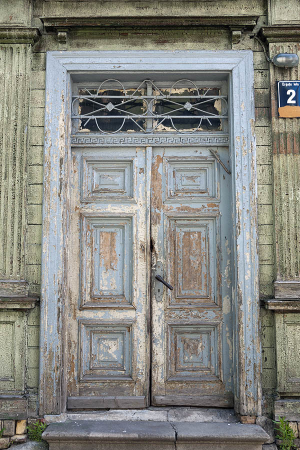 Photo 19569: Decayed, panelled, carved, latticed, light blue double door with top window
