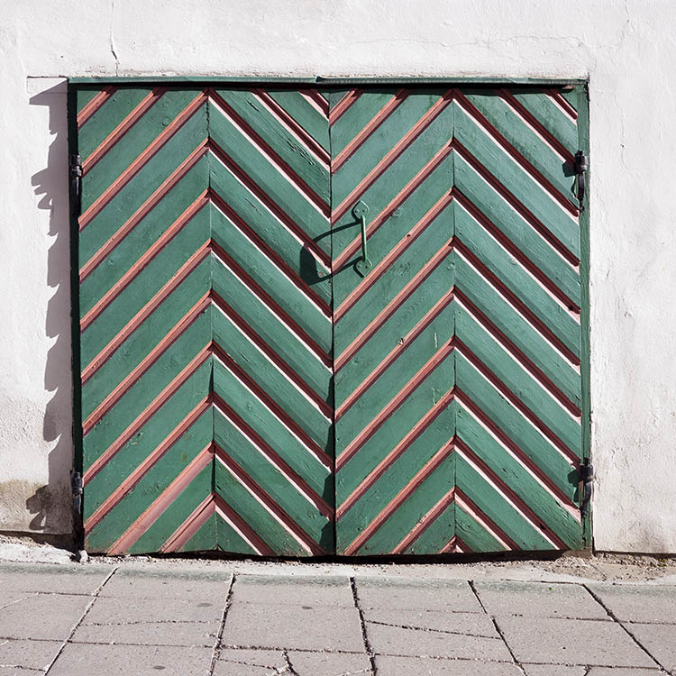 Photo 20295: Green and red garage door of diagonal boards