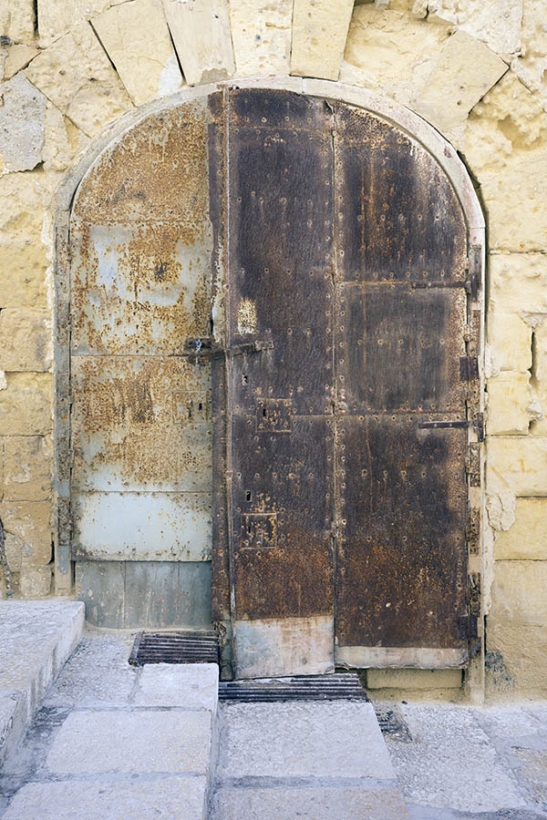 Photo 24085: Decayed, formed, lopsided, grey double door with rusty metal cover