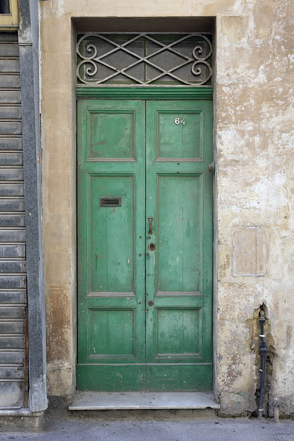 Photo 24161: Narrow, panelled, green double door with latticed top window