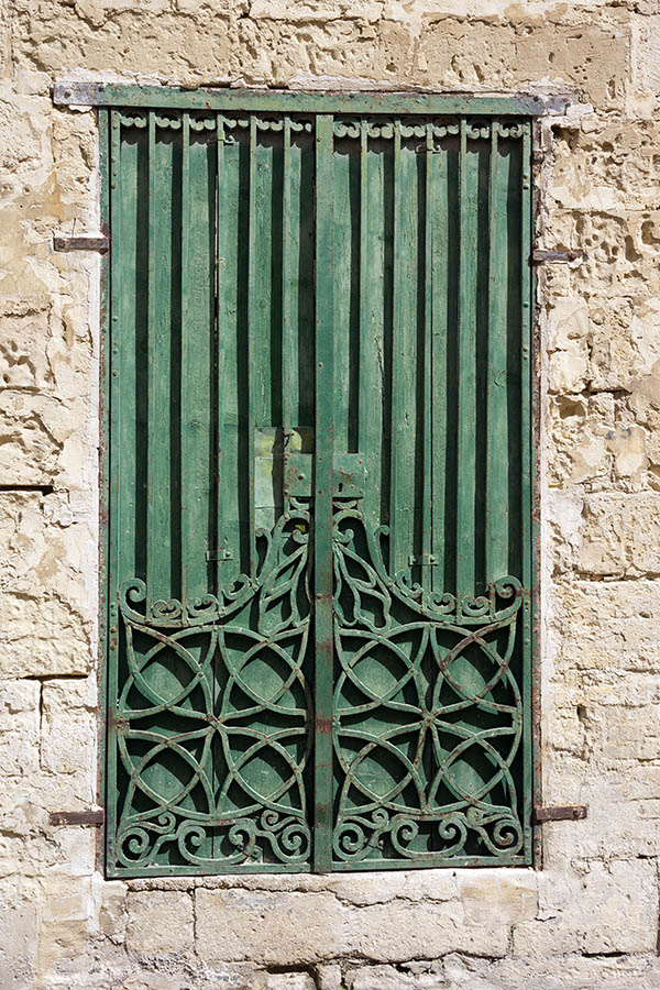 Photo 24284: Worn, green, latticed metal double door