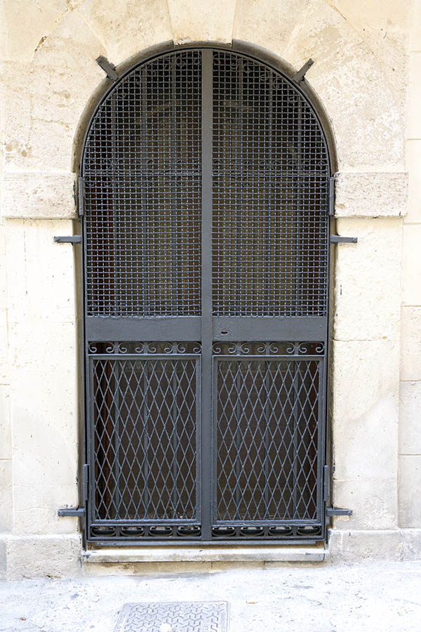 Photo 24366: Formed, latticed, barred, black metal double door