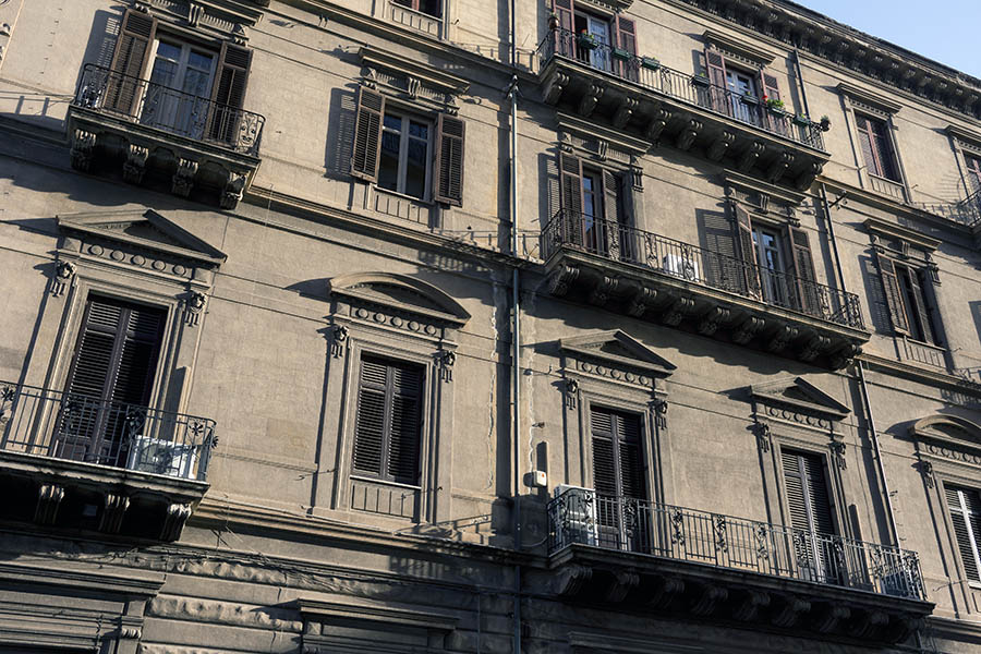 Photo 24637: Decorated, brown facade of a residential property