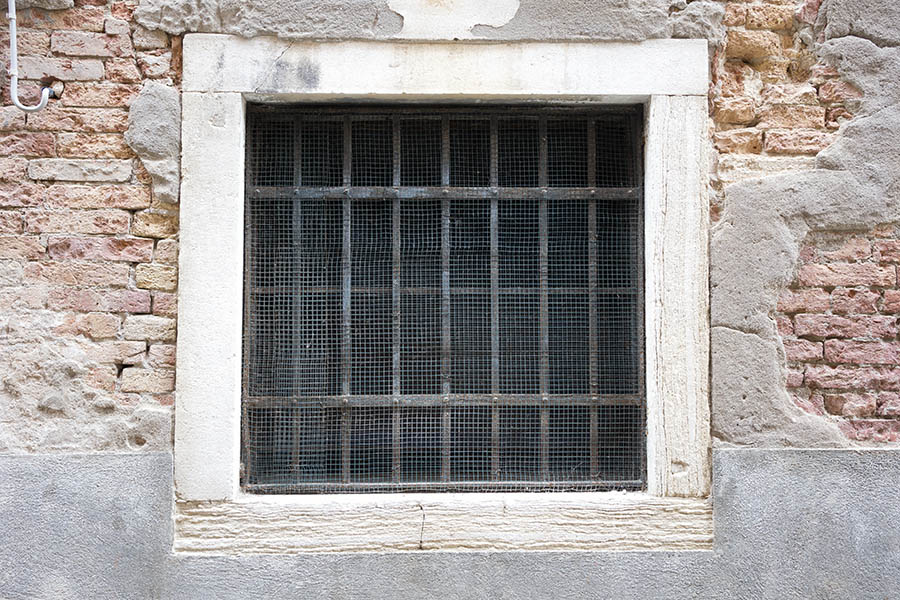 Photo 24785: Latticed, barred, black metal window