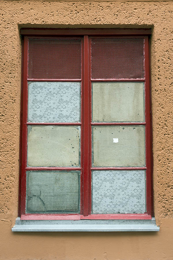 Photo 24910: Red window with eight covered panes