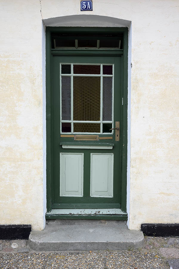 Photo 25068: Worn, panelled, green and light green door with large door light and top window