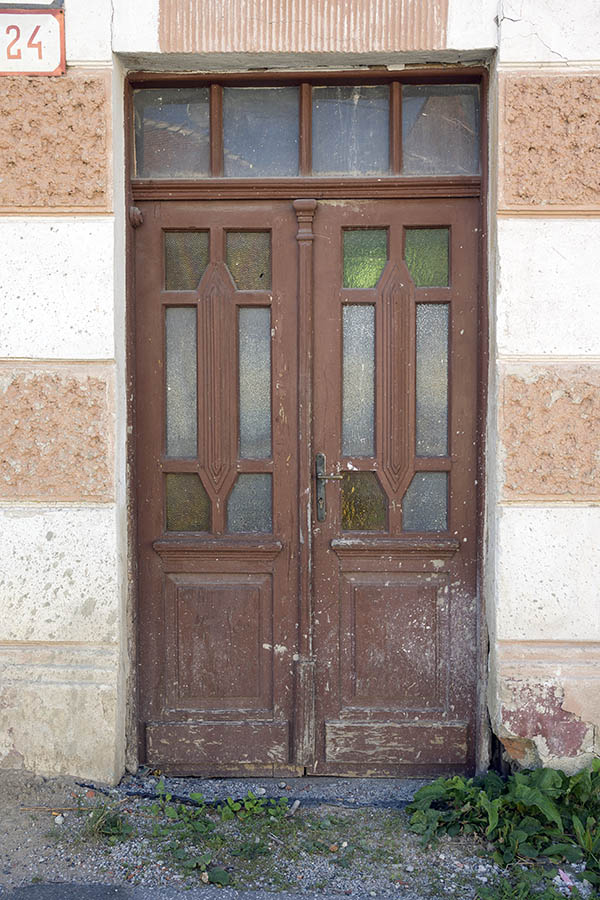 Photo 25371: Worn, panelled, carved, brown double door with formed door lights and top window in Art Nouveau styl