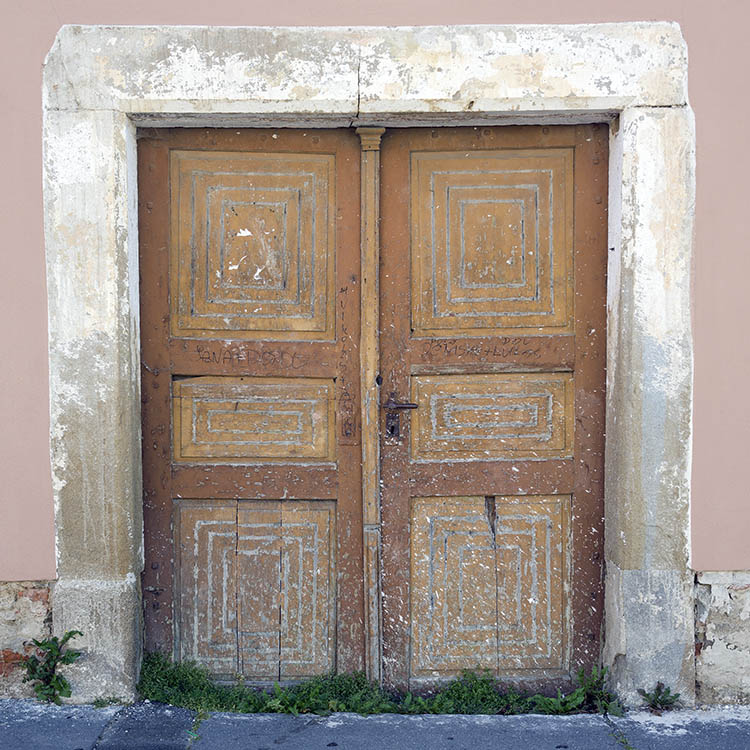 Photo 25374: Decayed, panelled, orange and brown double door