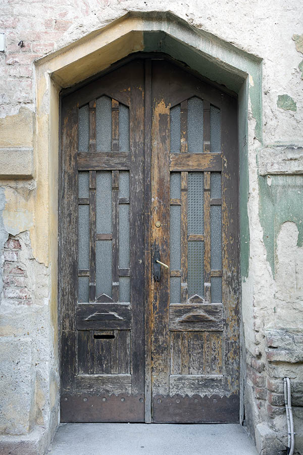 Photo 25828: Decayed, panelled, carved, formed, brown and unpainted double door