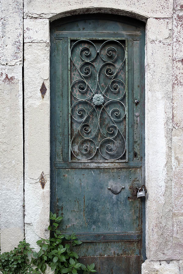 Photo 26581: Teal, panelled, metal door with lattice
