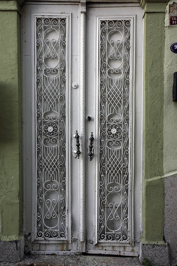 Photo 26608: Narrow, white double door with large lattice