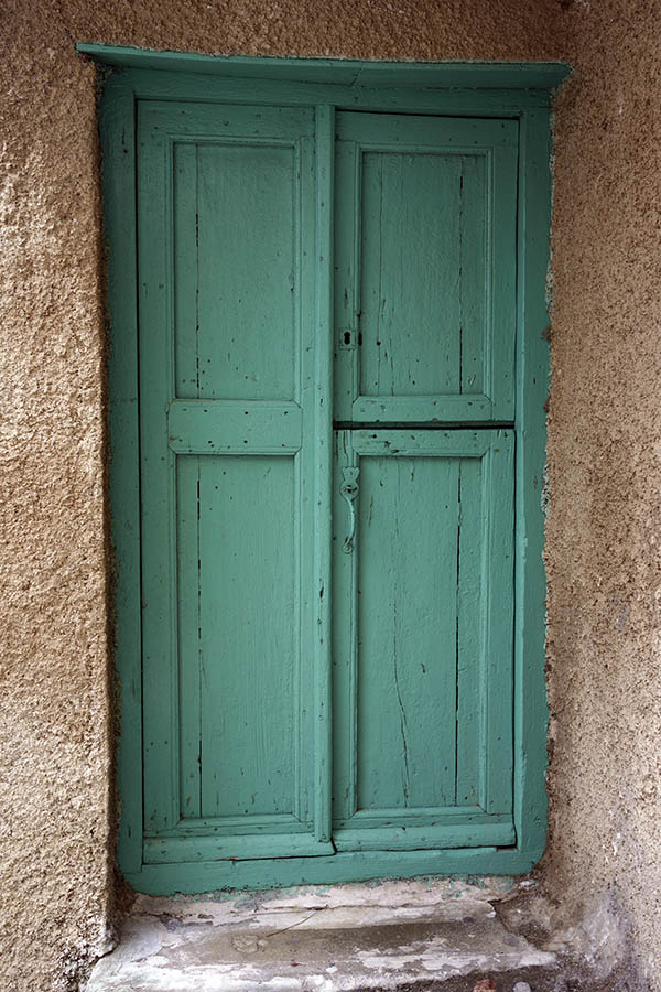 Photo 26703: Worn, light green, panelled double door (one half door)