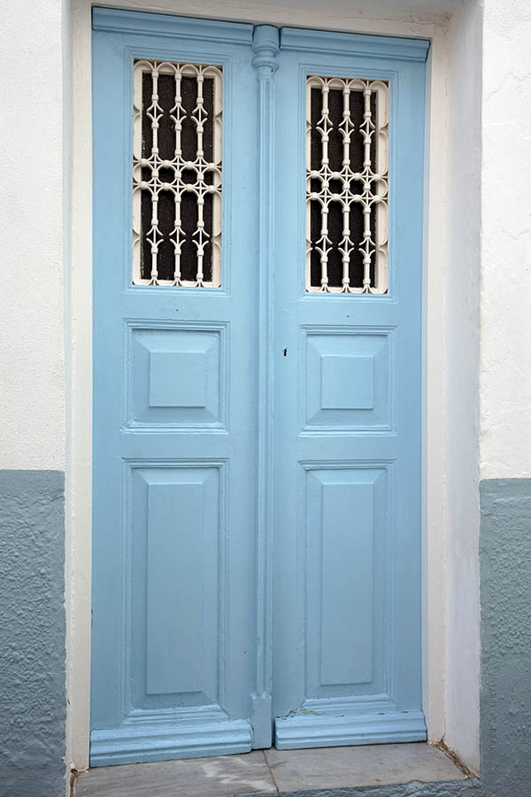 Photo 26760: Narrow, light blue double door with latticed, white windows