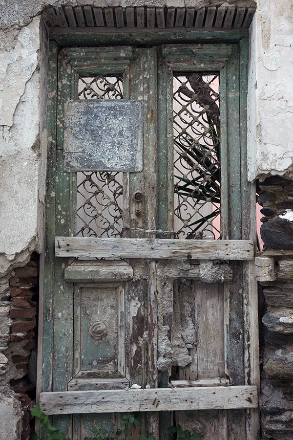 Photo 26875: No door. Remains of a light green double door with lattice